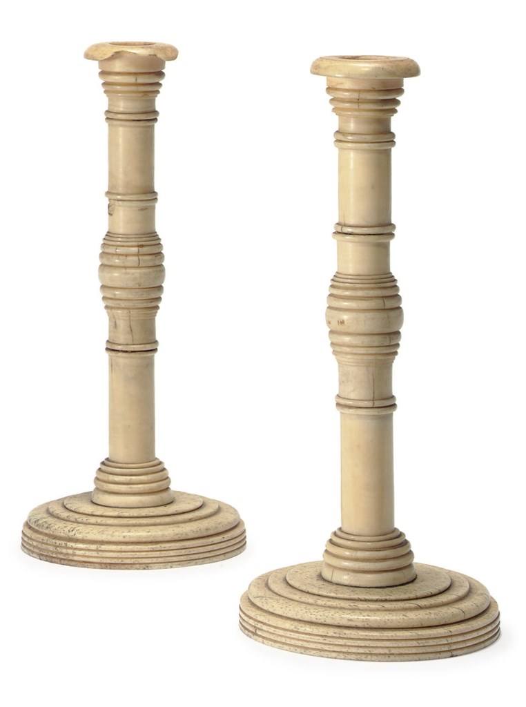 A PAIR OF WHALEBONE AND IVORY CANDLESTICKS