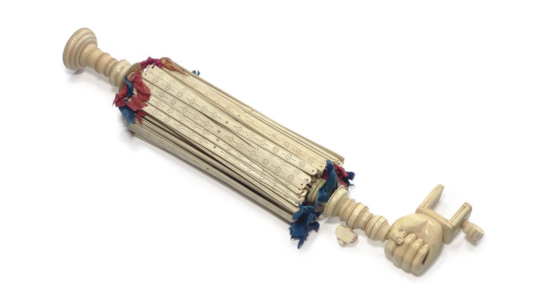 A CARVED WHALEBONE SWIFT