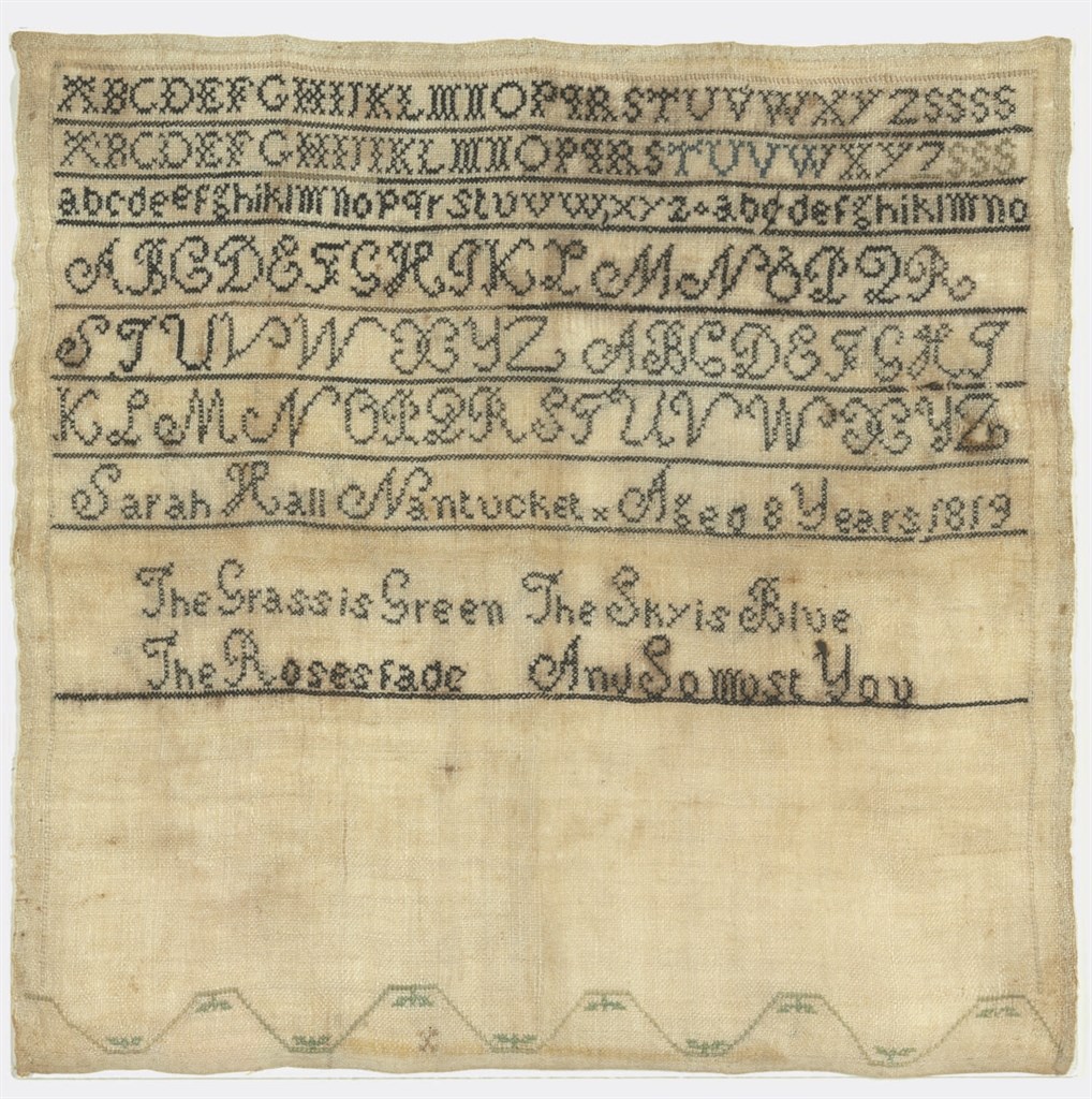 A SILK AND LINEN NEEDLEWORK SAMPLER