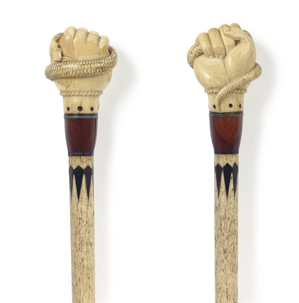 AN IVORY AND WHALE BONE 'FIST AND SERPENT' WALKING STICK