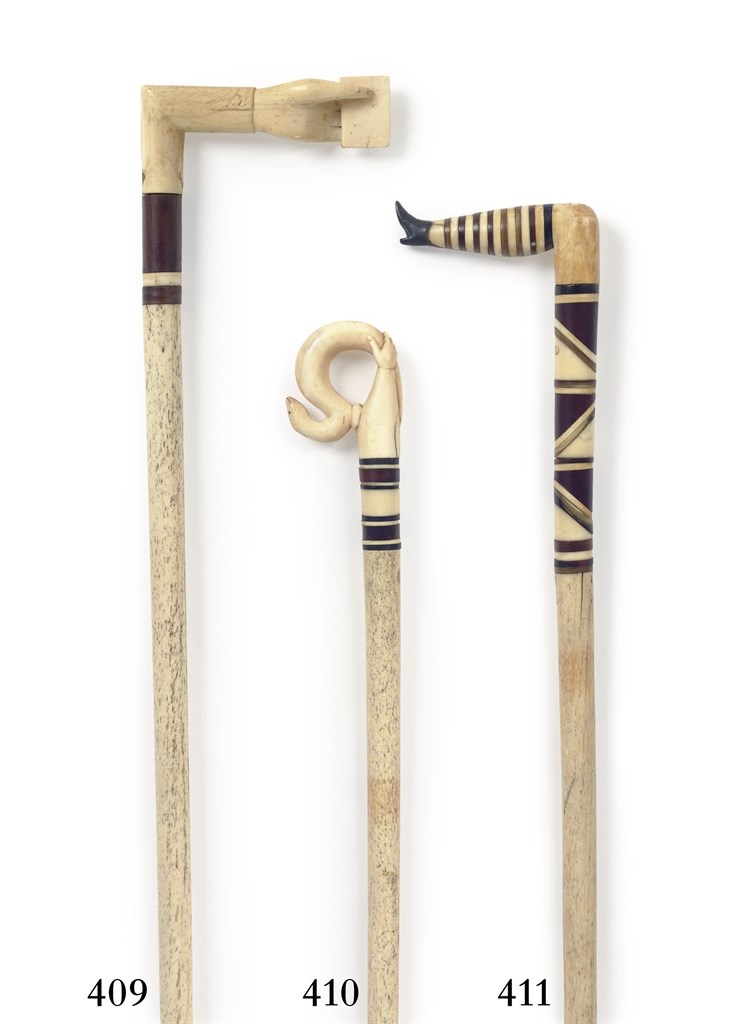 AN IVORY AND HORN 'NAUGHTY STOCKING LEG' WALKING STICK