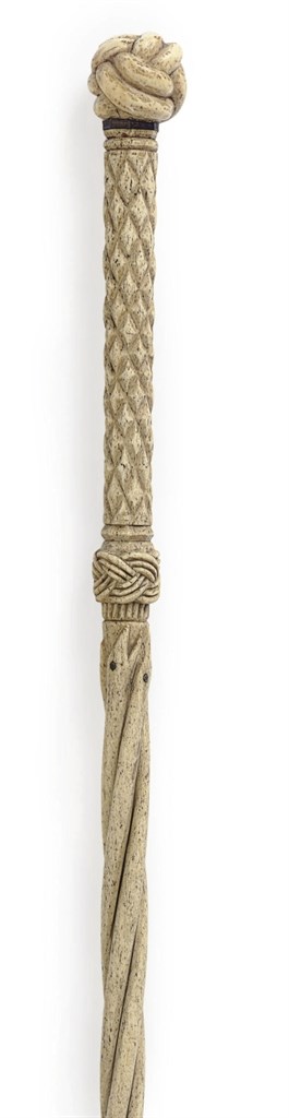 A CARVED BONE 'MONKEY FIST' WALKING STICK