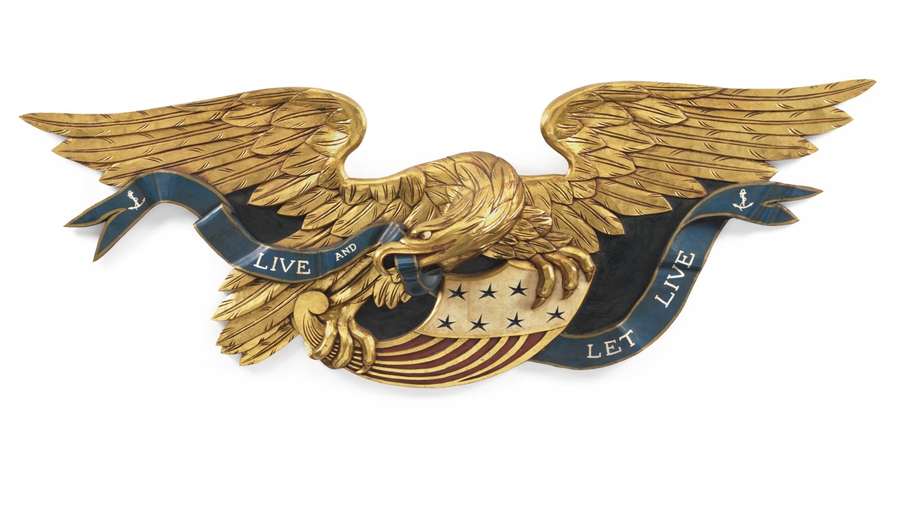 A CARVED PAINTED AND GILTWOOD WALL EAGLE