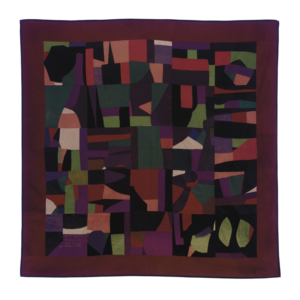 A PIECED COTTON CRAZY QUILT