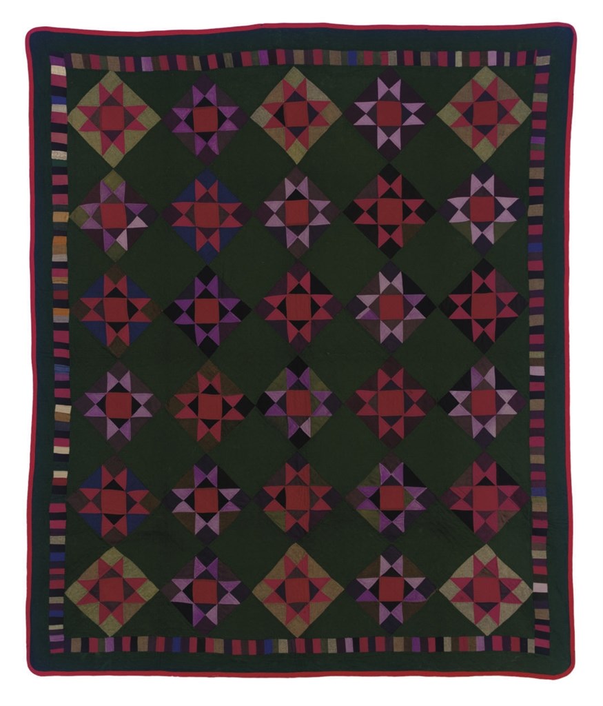 A PIECED WOOL 'CHINESE STARS' QUILT