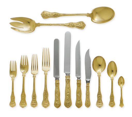 AN EXTENSIVE SILVER-GILT FLATWARE SERVICE