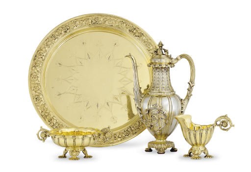 A SILVER-GILT THREE-PIECE COFFEE SERVICE WITH TRAY, THE COFFEE POT FROM THE 1900 PARIS AND 1901 BUFFALO EXPOSITIONS**