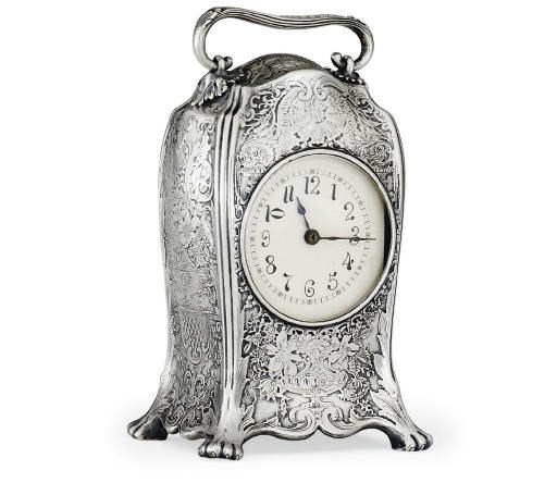 A SILVER CARRIAGE CLOCK