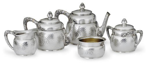 A SILVER FIVE-PIECE TEA AND COFFEE SERVICE**