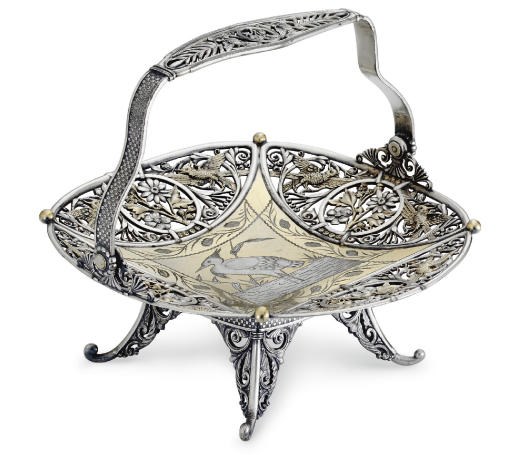A PARCEL-GILT SILVER-PLATED BASKET