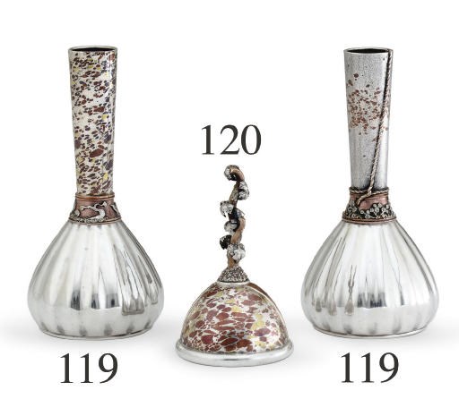 A SILVER AND MIXED-METAL BELL