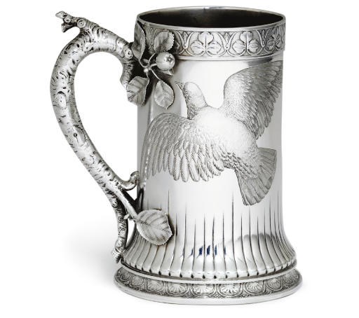 A SILVER TROPHY CUP