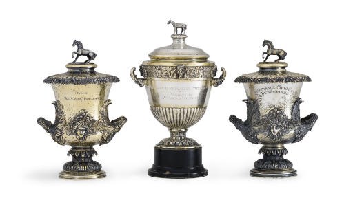 A GROUP OF THREE SILVER-GILT HORSE TROPHIES