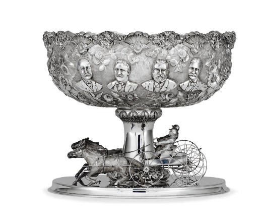 A SILVER WAGON RACING TROPHY