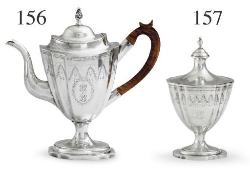A SILVER TEAPOT