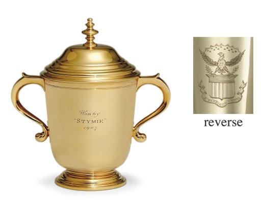 A GOLD TROPHY CUP AND COVER: WON BY STYMIE