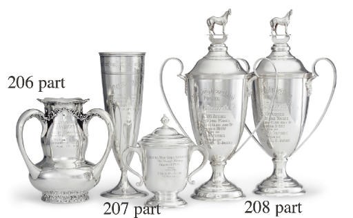 FOUR SILVER TWO-HANDLED TROPHY CUPS AND COVERS: WON BY SEARCHING