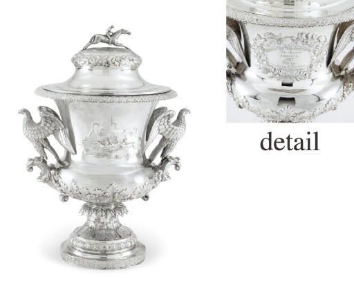 A SILVER TROPHY CUP AND COVER: WON BY PROMISED LAND