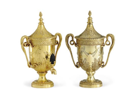 A PAIR OF SILVER-GILT HOT WATER URN TROPHIES**