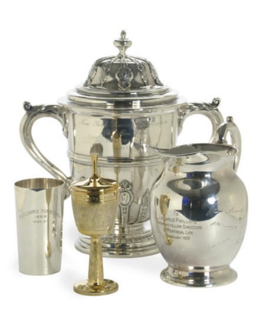 A GROUP OF SILVER AND SILVER-PLATED EQUESTRIAN TROPHIES AND PRESENTATION PITCHERS,