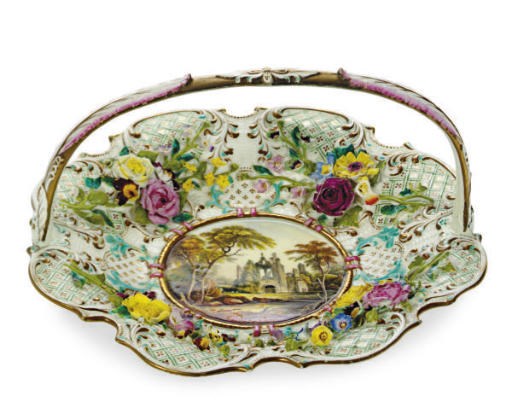 AN ENGLISH PORCELAIN FLOWER-ENCRUSTED TOPOGRAPHICAL BASKET,
