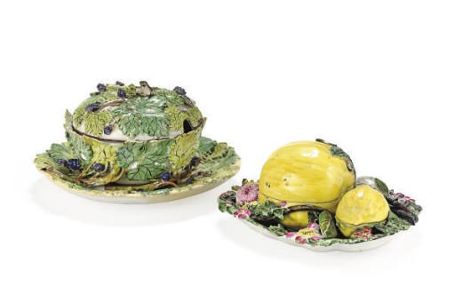 TWO CONTINENTAL FAYENCE TUREENS AND COVERS,