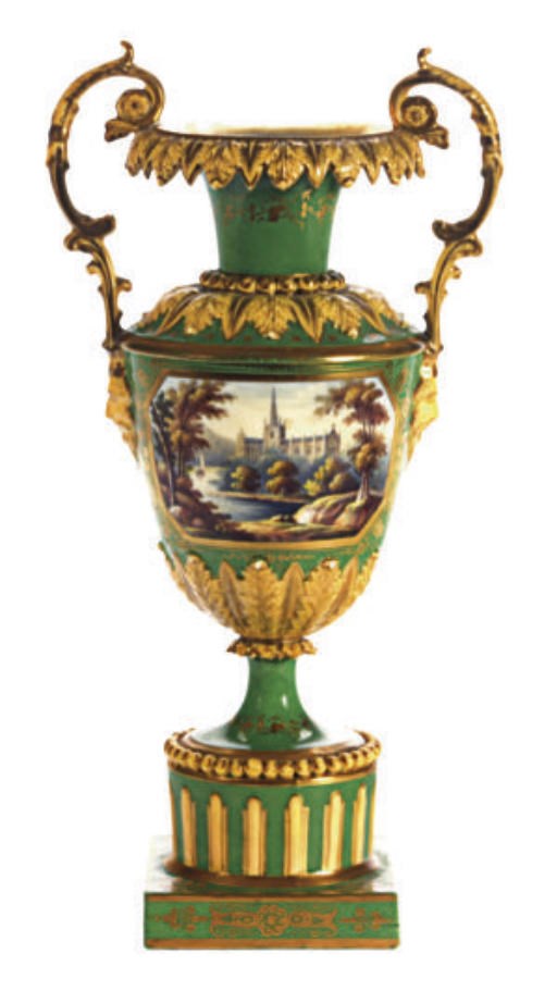 AN ENGLISH PORCELAIN APPLE GREEN AND YELLOW GROUND TWO-HANDLED VASE PAINTED WITH A VIEW OF A CATHEDRAL,