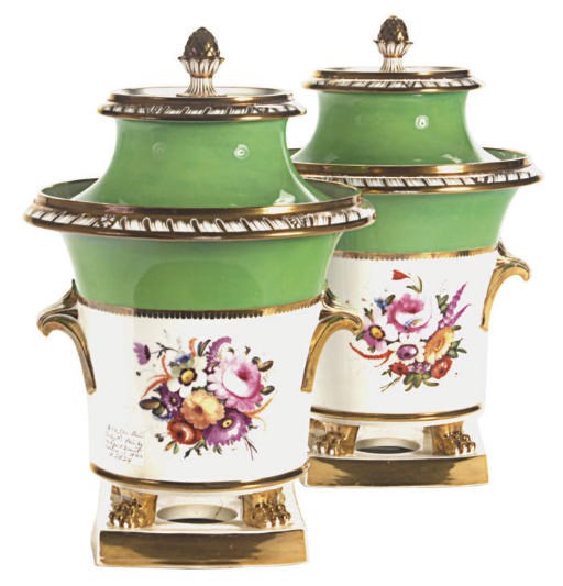 AN ENGLISH PORCELAIN PAIR OF APPLE GREEN GROUND PAW FOOTED FRUIT COOLERS AND COVERS,
