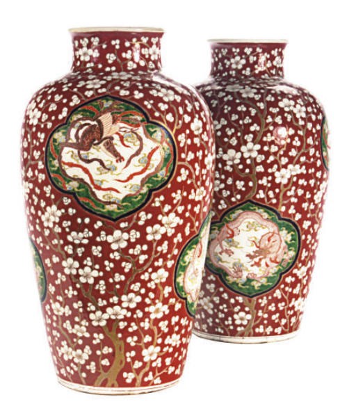 A PAIR OF JAPANESE RED GROUND OVULAR-SHAPED LARGE VASES,