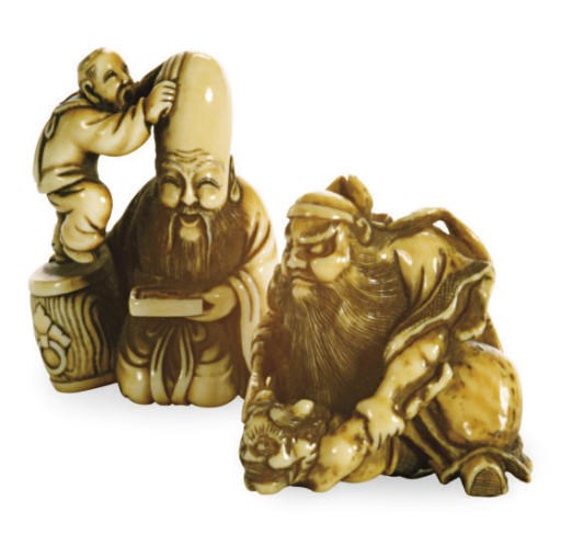 A GROUP OF THREE JAPANESE IVORY NETSUKE,**