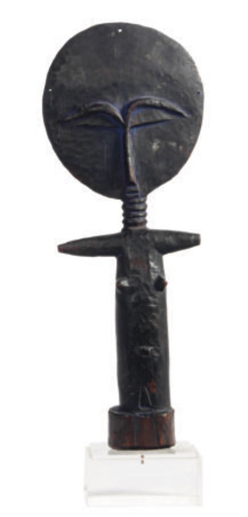 A WEST AFRICAN WOOD DOLL,
