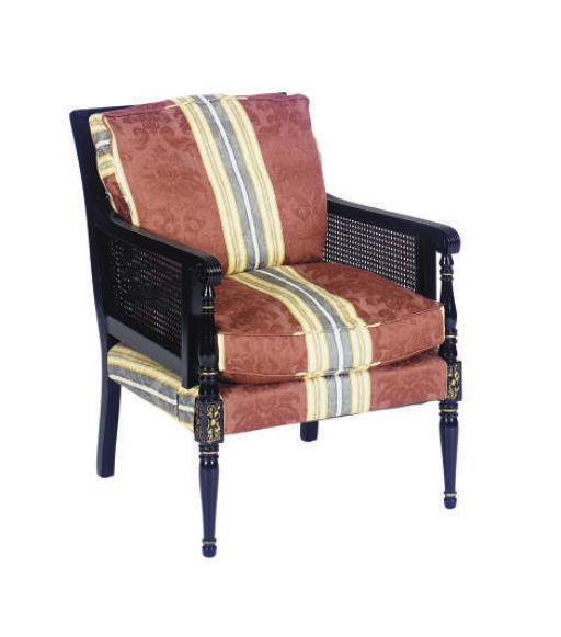 AN EBONIZED, PARCEL-GILT AND CANED ARMCHAIR,