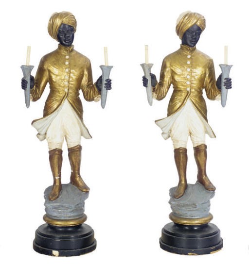 A PAIR OF POLYCHROME-PAINTED PLASTER 'BLACKAMOOR' TWO-LIGHT TORCHERES,