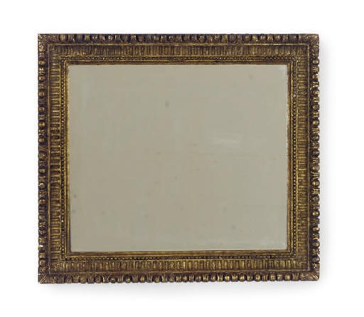 AN EGG-AND-DART CARVED GILTWOOD WALL MIRROR,