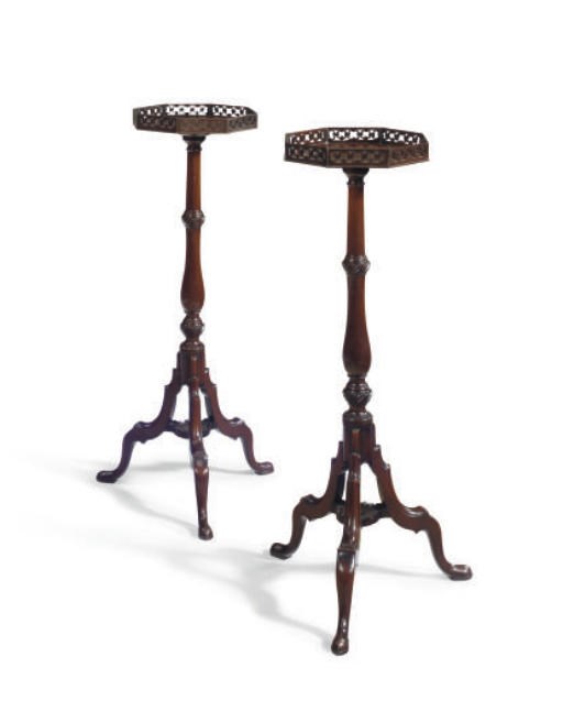 A PAIR OF MAHOGANY TORCHERE STANDS,