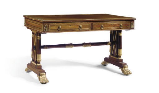 AN ENGLISH BRASS-INLAID AND MOUNTED PARCEL-EBONIZED AND PARCEL-GILT ROSEWOOD WRITING-TABLE**,