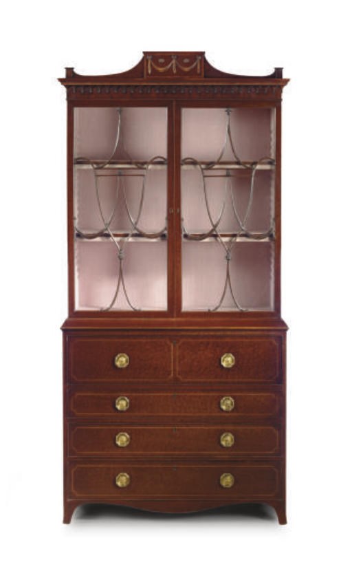 A GEORGE III PLUM-PUDDING MAHOGANY AND ROSEWOOD-INLAID SECRETAIRE- CABINET**,