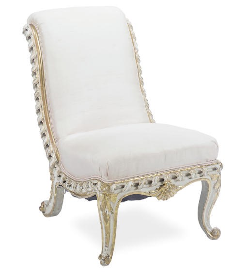AN ITALIAN PAINTED AND PARCEL-GILT SLIPPER CHAIR,