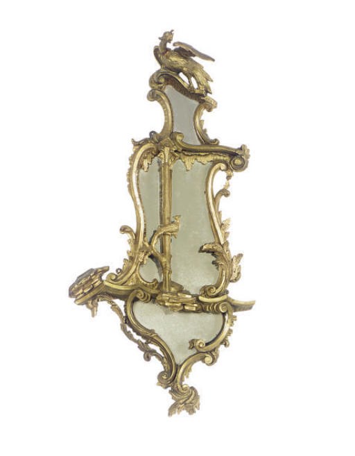 AN ENGLISH GILTWOOD MIRROR,