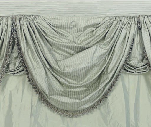 A SEAFOAM GREEN SILK TAFFETA CURTAIN,
