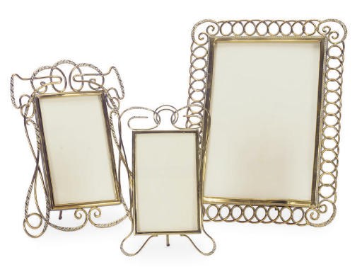 A GROUP OF THREE BRASS PICTURE FRAMES,