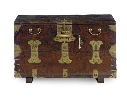 A KOREAN GILT-METAL MOUNTED HARDWOOD LOW CHEST,