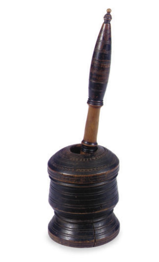 A TURNED WOOD MORTAR AND PESTLE,