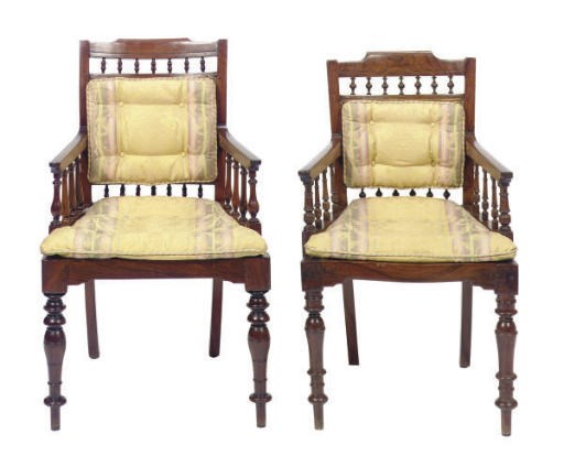 A MATCHED SET OF SIX ANGLO-INDIAN ROSEWOOD, HARDWOOD AND CANED ARMCHAIRS**,