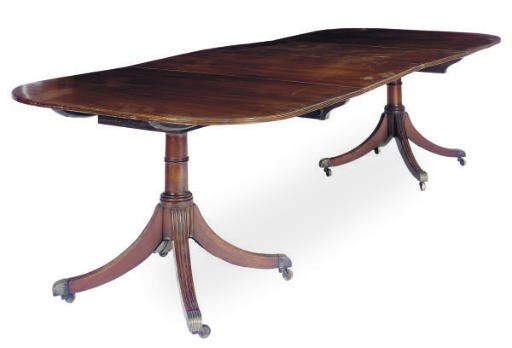 A REGENCY MAHOGANY TWO-PEDESTAL DINING-TABLE