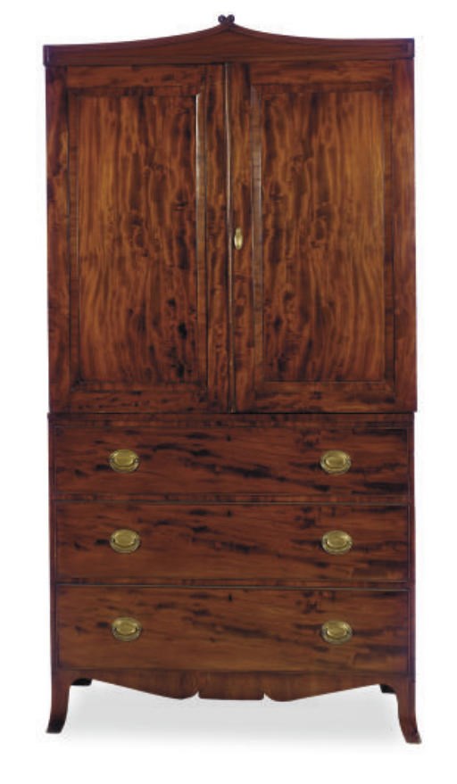 A LATE GEORGE III MAHOGANY LINEN PRESS,