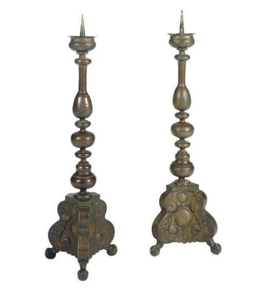 A PAIR OF CONTINENTAL COPPER ALTAR STICKS,