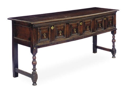 A CHARLES II OAK DRESSER,