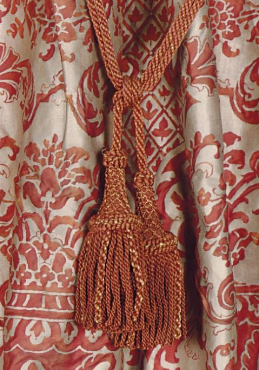 A SELECTION OF FORTUNY BURNT RED AND METALLIC FABRIC CURTAINS,