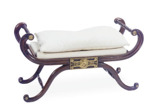 A REGENCY PARCEL-GILT STAINED BEECHWOOD WINDOW-BENCH,